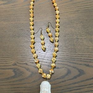 Women’s necklace and earrings. Hand crafted and designed by Quinn and Flynn